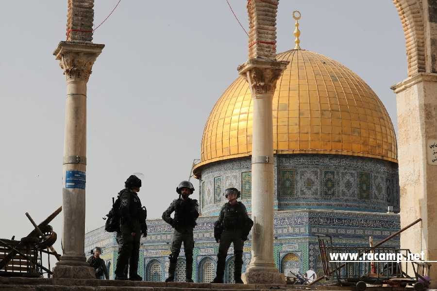 Israeli police stand in front of the Dome of the Rock during clashes with Palestinians at the compound that houses Al-Aqsa Mosque, known to Muslims as Noble Sanctuary and to Jews as Temple Mount, in Jerusalem's Old City, May 10, 2021. REUTERS/Ammar Awad