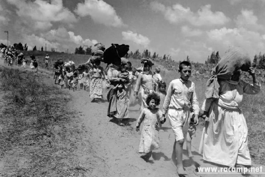 Palestinian refugees fleeing their homes near Haifa, June 1948 Credit_ Corbis
